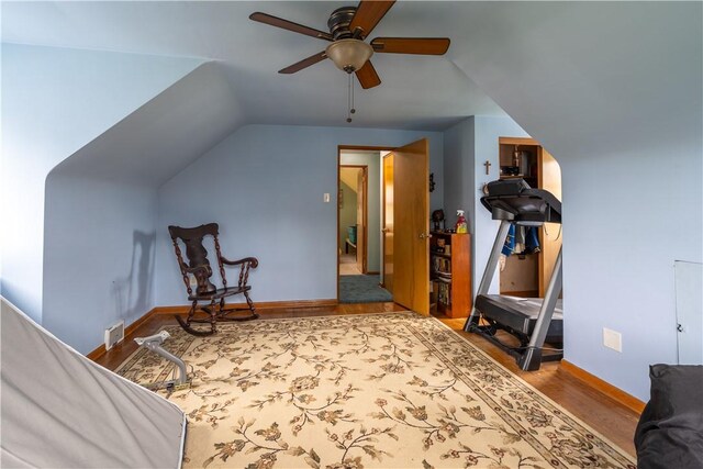 600 Margaret St, Mount Oliver, PA 15210 - workout area with ceiling fan, wood finished floors, vaulted ceiling, and baseboards