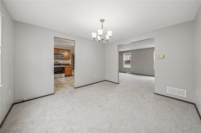 1056 Mcallister Dr, Plum Boro, PA 15068 - spare room with a chandelier, baseboards, and light carpet