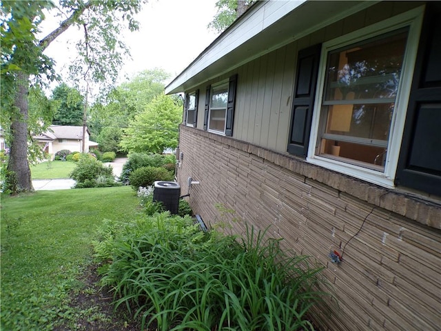 1235 Old Concord Rd, Monroeville, PA 15146 - view of home's exterior featuring central AC, a yard, and brick siding