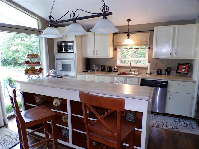 1235 Old Concord Rd, Monroeville, PA 15146 - kitchen featuring appliances with stainless steel finishes, a sink, open shelves, and white cabinetry