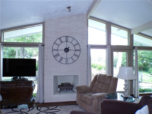 1235 Old Concord Rd, Monroeville, PA 15146 - living room featuring a fireplace, wood finished floors, and healthy amount of natural light