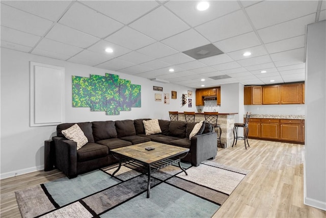 97 Clover Ln, Pine Twp Nal, PA 15044 - living area featuring light wood-style floors, baseboards, a paneled ceiling, and recessed lighting