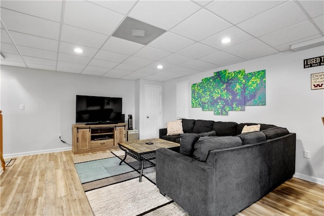 97 Clover Ln, Pine Twp Nal, PA 15044 - living room featuring light wood-style floors, baseboards, recessed lighting, and a drop ceiling