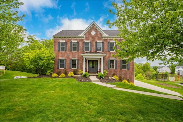 97 Clover Ln, Pine Twp Nal, PA 15044 - colonial home featuring a front yard, brick siding, and french doors