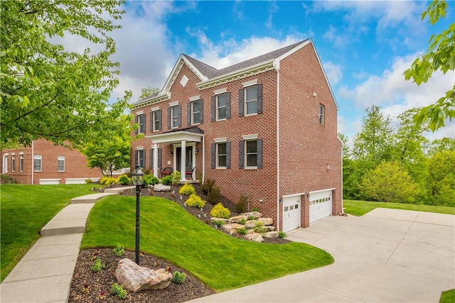 97 Clover Ln, Pine Twp Nal, PA 15044 - view of front facade featuring brick siding, concrete driveway, a front yard, and a garage