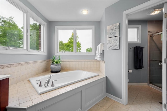 97 Clover Ln, Pine Twp Nal, PA 15044 - full bath with a stall shower, toilet, a garden tub, and tile patterned flooring