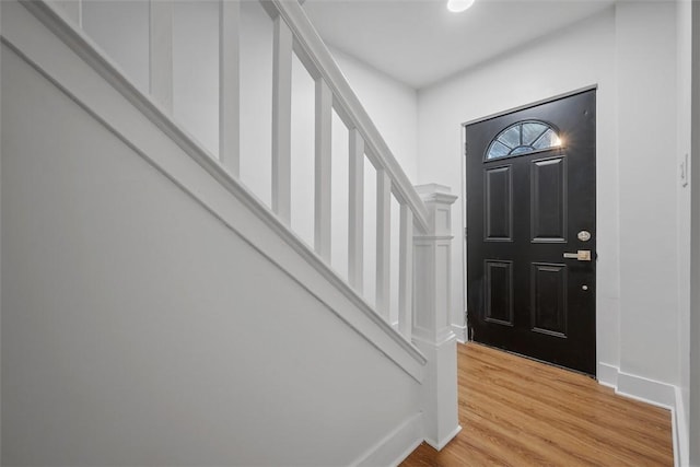 230 Linnview Ave, Carrick, PA 15210 - entrance foyer with baseboards, stairs, and light wood finished floors