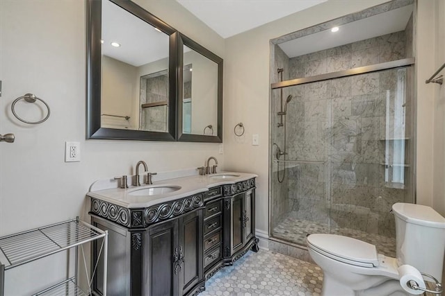 810 S Braddock Ave, Regent Square, PA 15221 - full bathroom featuring toilet, a shower stall, double vanity, and recessed lighting
