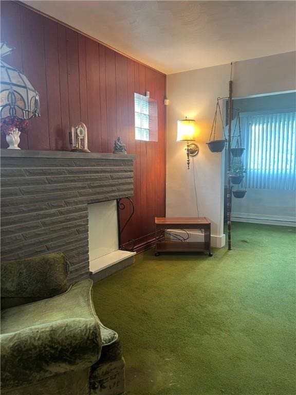 1929 Alcoa Dr, Arnold, PA 15068 - living area with carpet flooring, a fireplace, and wooden walls