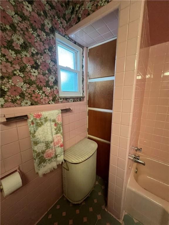1929 Alcoa Dr, Arnold, PA 15068 - full bath with wallpapered walls, tile walls, a wainscoted wall, and bathtub / shower combination