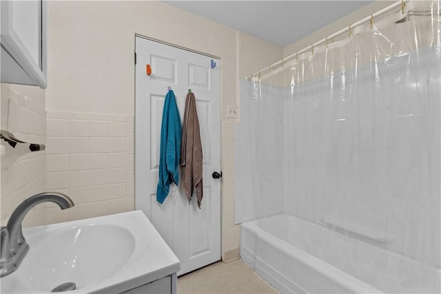 115 Frederick St, Mount Oliver, PA 15210 - full bath with shower / bath combo, vanity, and tile walls