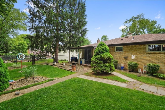 441 Wyndhurst Dr, Moon/Crescent Twp, PA 15108 - view of yard featuring a sunroom