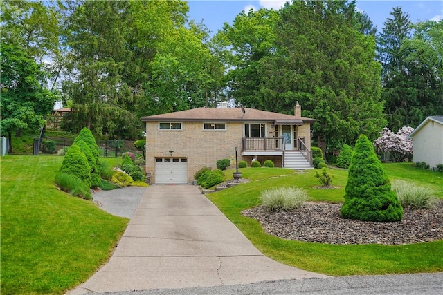 441 Wyndhurst Dr, Moon/Crescent Twp, PA 15108 - view of front of property featuring a chimney, driveway, a garage, and a front lawn