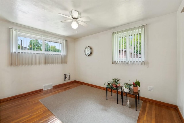 441 Wyndhurst Dr, Moon/Crescent Twp, PA 15108 - unfurnished room featuring wood finished floors, ceiling fan, and baseboards