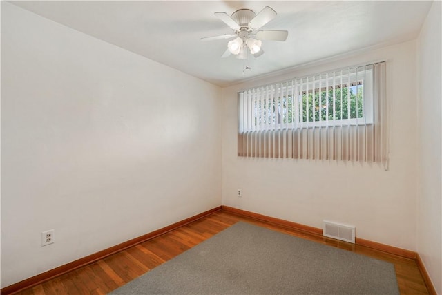 441 Wyndhurst Dr, Moon/Crescent Twp, PA 15108 - spare room with baseboards, wood finished floors, and ceiling fan