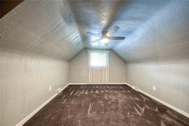62 Spring St, Etna, PA 15223 - additional living space with carpet, a ceiling fan, baseboards, a textured ceiling, and lofted ceiling