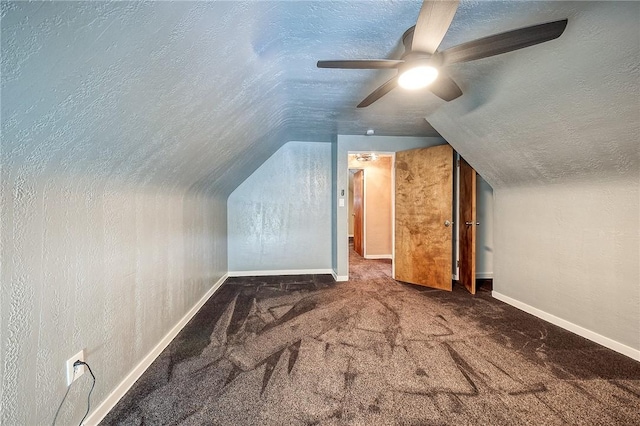 62 Spring St, Etna, PA 15223 - bonus room featuring a textured ceiling, lofted ceiling, carpet floors, ceiling fan, and baseboards