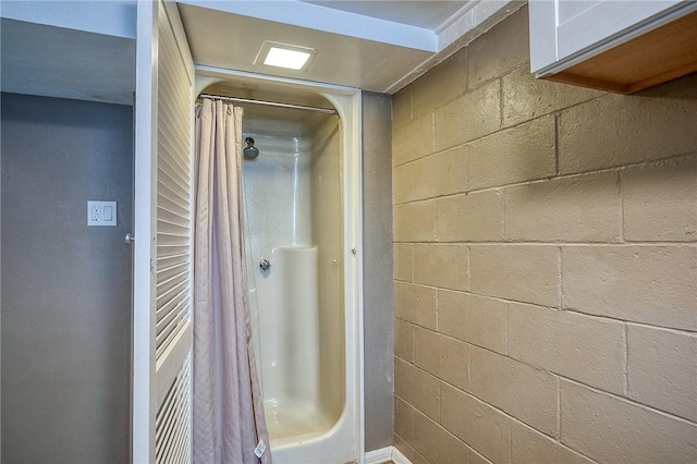 62 Spring St, Etna, PA 15223 - bathroom with curtained shower and concrete block wall