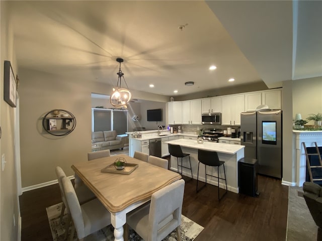 173 Rylie Dr, Lehigh Twp, PA 16037 - dining area with dark wood-style floors, recessed lighting, and a chandelier