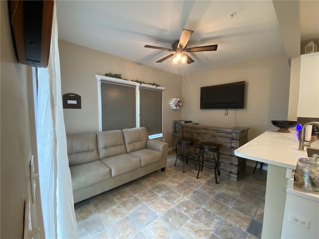 173 Rylie Dr, Lehigh Twp, PA 16037 - living area featuring a ceiling fan and stone finish flooring