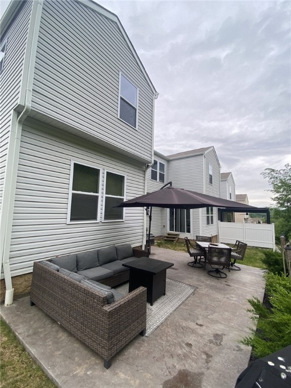 173 Rylie Dr, Lehigh Twp, PA 16037 - rear view of property featuring an outdoor hangout area, a patio area, and outdoor dining area