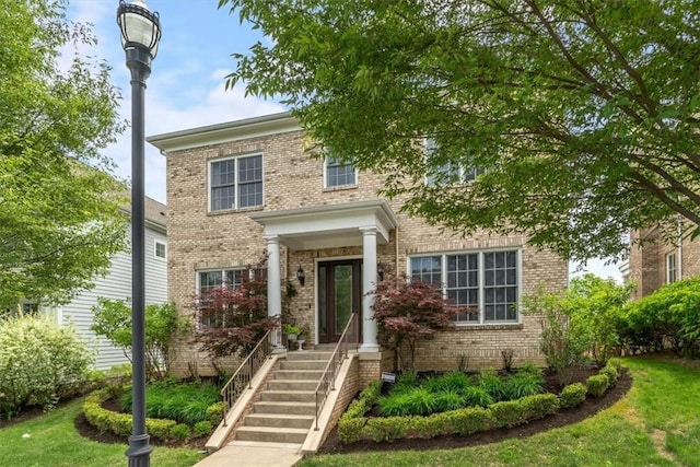 1690 Shelburne Ln, Squirrel Hill, PA 15217 - view of front of home featuring brick siding and a front lawn