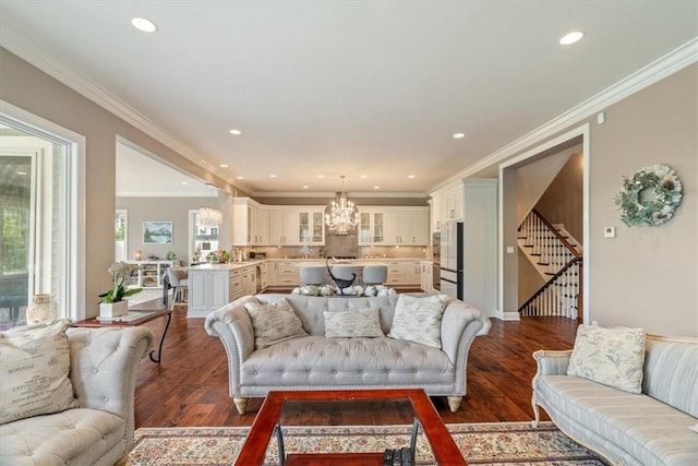 1690 Shelburne Ln, Squirrel Hill, PA 15217 - living area with stairway, dark wood-style floors, recessed lighting, a chandelier, and crown molding