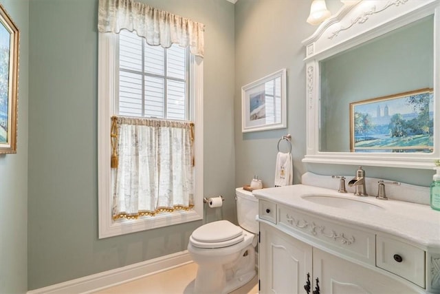 1690 Shelburne Ln, Squirrel Hill, PA 15217 - half bathroom featuring toilet, vanity, and baseboards
