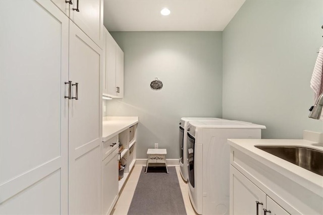 1690 Shelburne Ln, Squirrel Hill, PA 15217 - laundry room featuring washing machine and dryer, cabinet space, recessed lighting, and baseboards