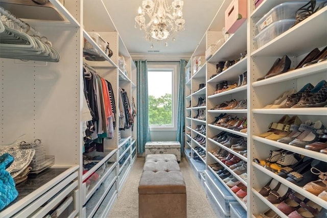 1690 Shelburne Ln, Squirrel Hill, PA 15217 - walk in closet with carpet and a chandelier