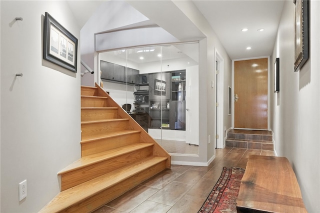 204 Bailey Ave, Mt Washington, PA 15211 - staircase with tile patterned flooring and recessed lighting