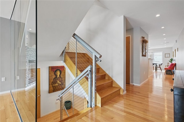 204 Bailey Ave, Mt Washington, PA 15211 - stairs with wood finished floors, baseboards, and recessed lighting