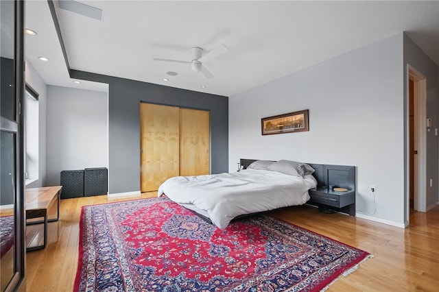 204 Bailey Ave, Mt Washington, PA 15211 - bedroom featuring light wood-style flooring, a closet, baseboards, ceiling fan, and recessed lighting
