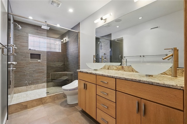204 Bailey Ave, Mt Washington, PA 15211 - bathroom featuring a shower stall, double vanity, toilet, tile patterned floors, and recessed lighting