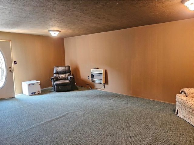 114 Leonard Rd, Washington Twp But, PA 16040 - sitting room with heating unit, carpet flooring, and a textured ceiling