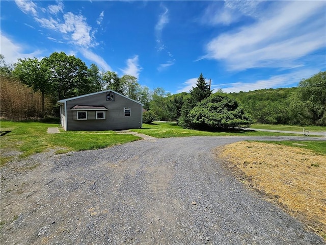 114 Leonard Rd, Washington Twp But, PA 16040 - view of property exterior featuring a yard and gravel driveway