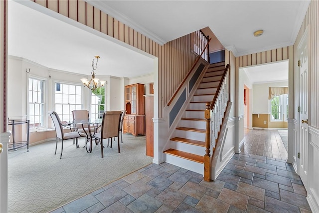 16 Mcbride Rd, North Strabane, PA 15317 - stairway with baseboards, stone tile floors, ornamental molding, a chandelier, and carpet