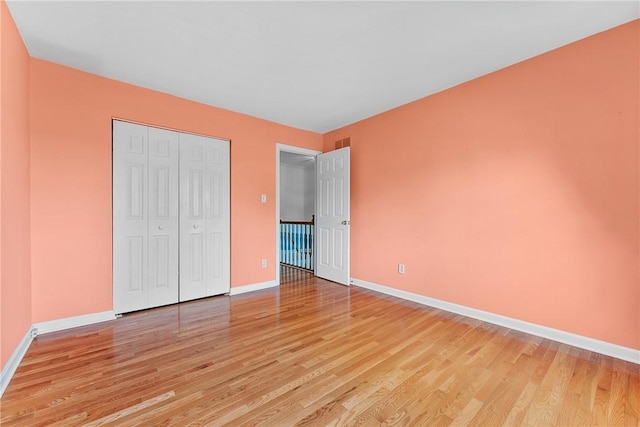 16 Mcbride Rd, North Strabane, PA 15317 - unfurnished bedroom with light wood-type flooring, baseboards, and a closet