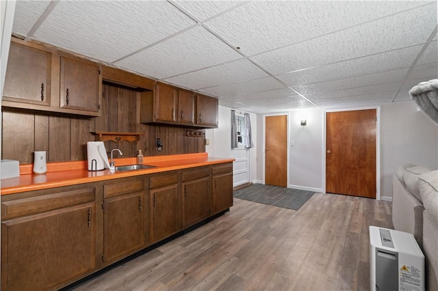 2418 Graceland Rd, Neshannock Twp, PA 16105 - kitchen with a sink, light countertops, baseboards, and wood finished floors