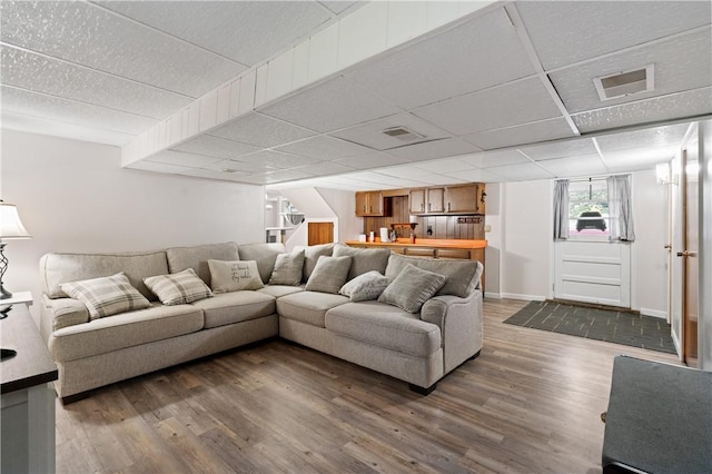 2418 Graceland Rd, Neshannock Twp, PA 16105 - living room with dark wood finished floors, a drop ceiling, and baseboards