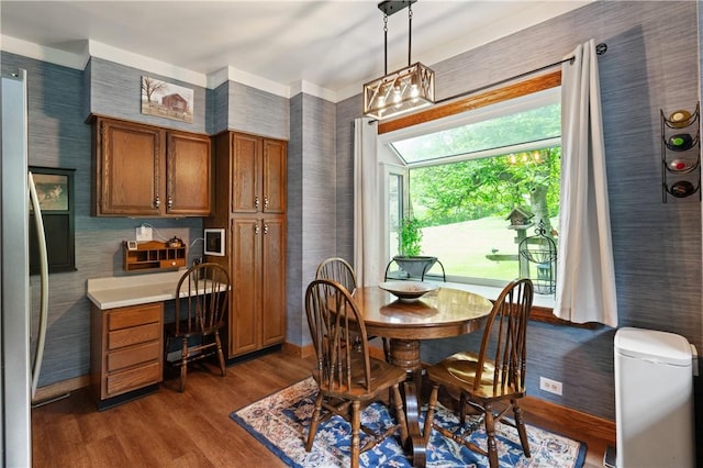 2418 Graceland Rd, Neshannock Twp, PA 16105 - dining room featuring wallpapered walls, dark wood-type flooring, and baseboards