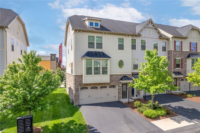876 Beacon Ln, Mccandless, PA 15237 - townhome / multi-family property featuring stone siding, an attached garage, driveway, board and batten siding, and a shingled roof