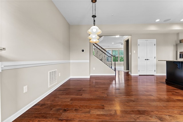 876 Beacon Ln, Mccandless, PA 15237 - unfurnished living room featuring wood finished floors, stairs, recessed lighting, and baseboards