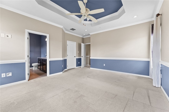 876 Beacon Ln, Mccandless, PA 15237 - unfurnished bedroom featuring a tray ceiling, light carpet, recessed lighting, crown molding, and baseboards