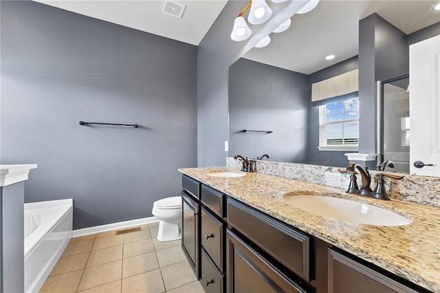 876 Beacon Ln, Mccandless, PA 15237 - full bath with tile patterned flooring, baseboards, toilet, double vanity, and a garden tub
