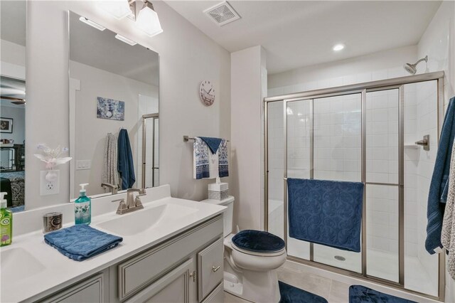 153 Olivia Dr, Center Twp Bea, PA 15061 - full bath featuring a shower stall, toilet, vanity, tile patterned floors, and recessed lighting