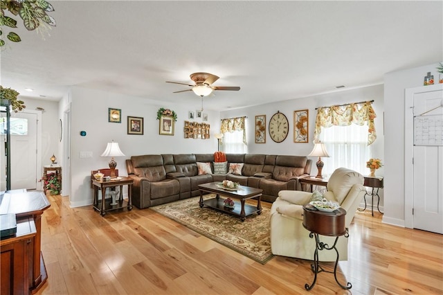 153 Olivia Dr, Center Twp Bea, PA 15061 - living area with a ceiling fan, light wood-style floors, and baseboards
