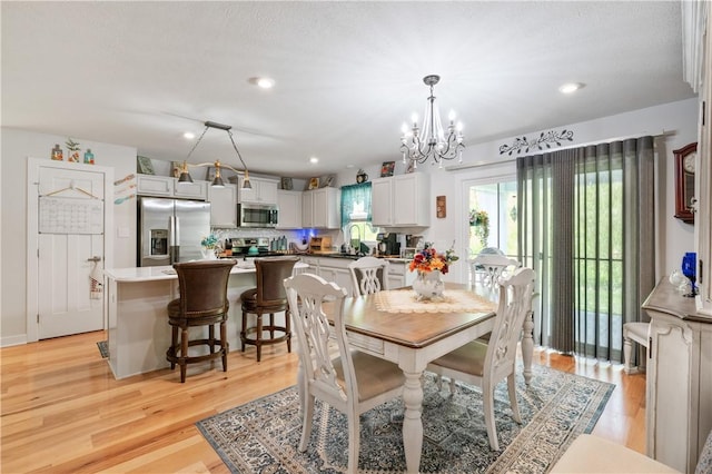 153 Olivia Dr, Center Twp Bea, PA 15061 - dining room featuring a chandelier, light wood-type flooring, and recessed lighting