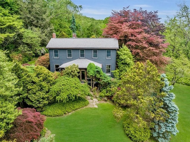 439 Pleasant Hill Rd, Allegheny Twp Wml, PA 15656 - colonial-style house featuring a chimney and a wooded view