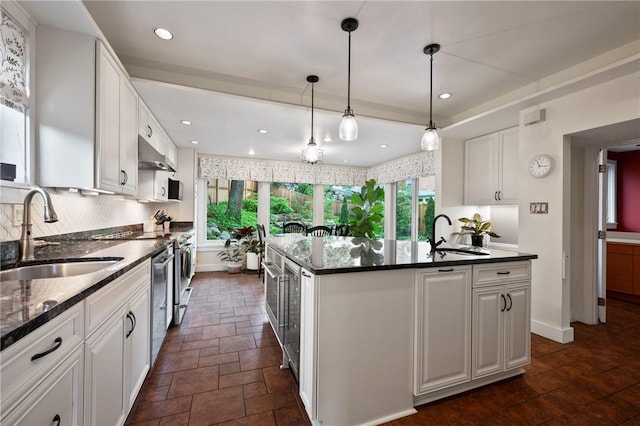 155 Westland Dr, Squirrel Hill, PA 15217 - kitchen featuring a sink, plenty of natural light, tasteful backsplash, and recessed lighting